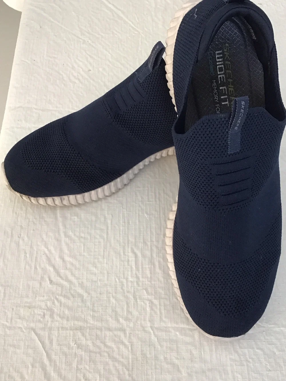 Skechers Men's Slip-On Knit Sneakers in Navy and White. ##